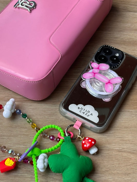 Pop Grippy para celular con diseño de perro globo rosa, accesorio sujetador magnético para móvil.
