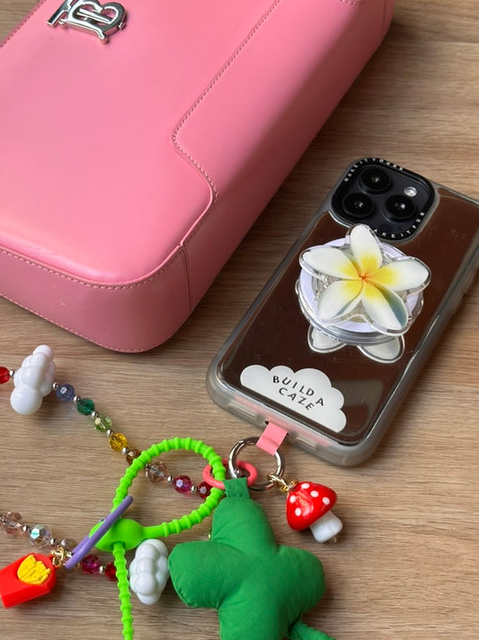 Sujetador Pop Grippy con diseño "Plummie Baby" para teléfono móvil, accesorio de agarre seguro y soporte para celular.