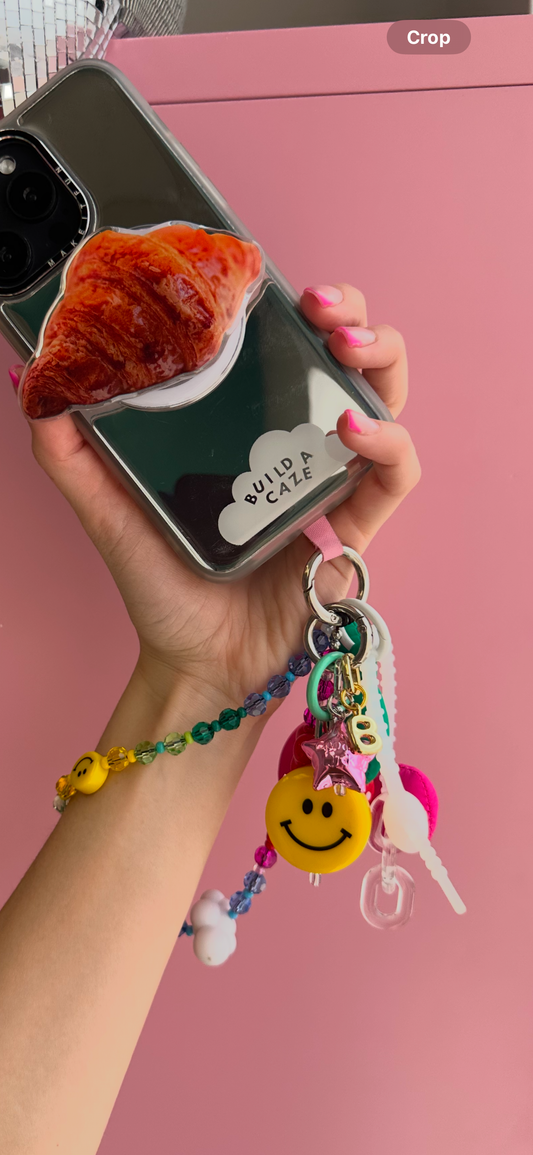 Accesorio de celular cutie-in con variante B, ideal para personalizar y proteger tu móvil.
