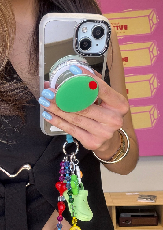 Pop Grippy de teléfono móvil, accesorio para celular. Diseño que imita una aceituna verde, grip, soporte, sujetador.