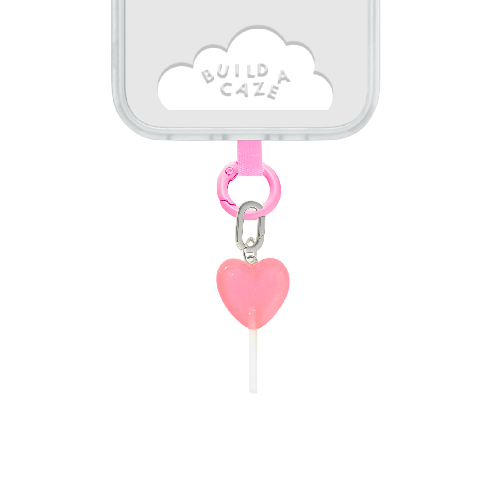 Un charm y accesorio colgante Coral Pink Lollie Pop Charmie en color rosa sujeto a un celular - Build A Caze