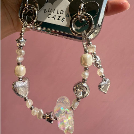Correa de muñeca para celular perlas plateadas dije flor iridiscente phone lanyard Build A Caze